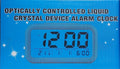 OPTICALLY CONTROLLED LIQUID
CRYSTAL DEVICE ALARM CLOCK